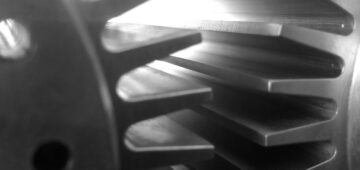 4th-axis CNC machined cooling fins in nickel - Parametric Manufacturing